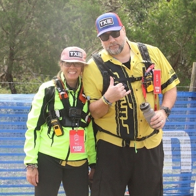 Two Stingers coaches at a race