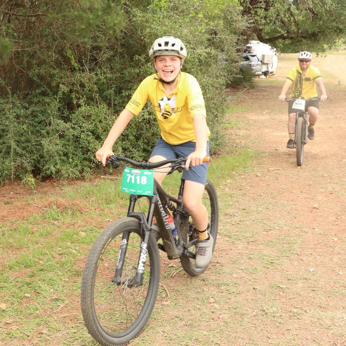 A Stingers rider and coach riding back together after a pre-ride, having fun